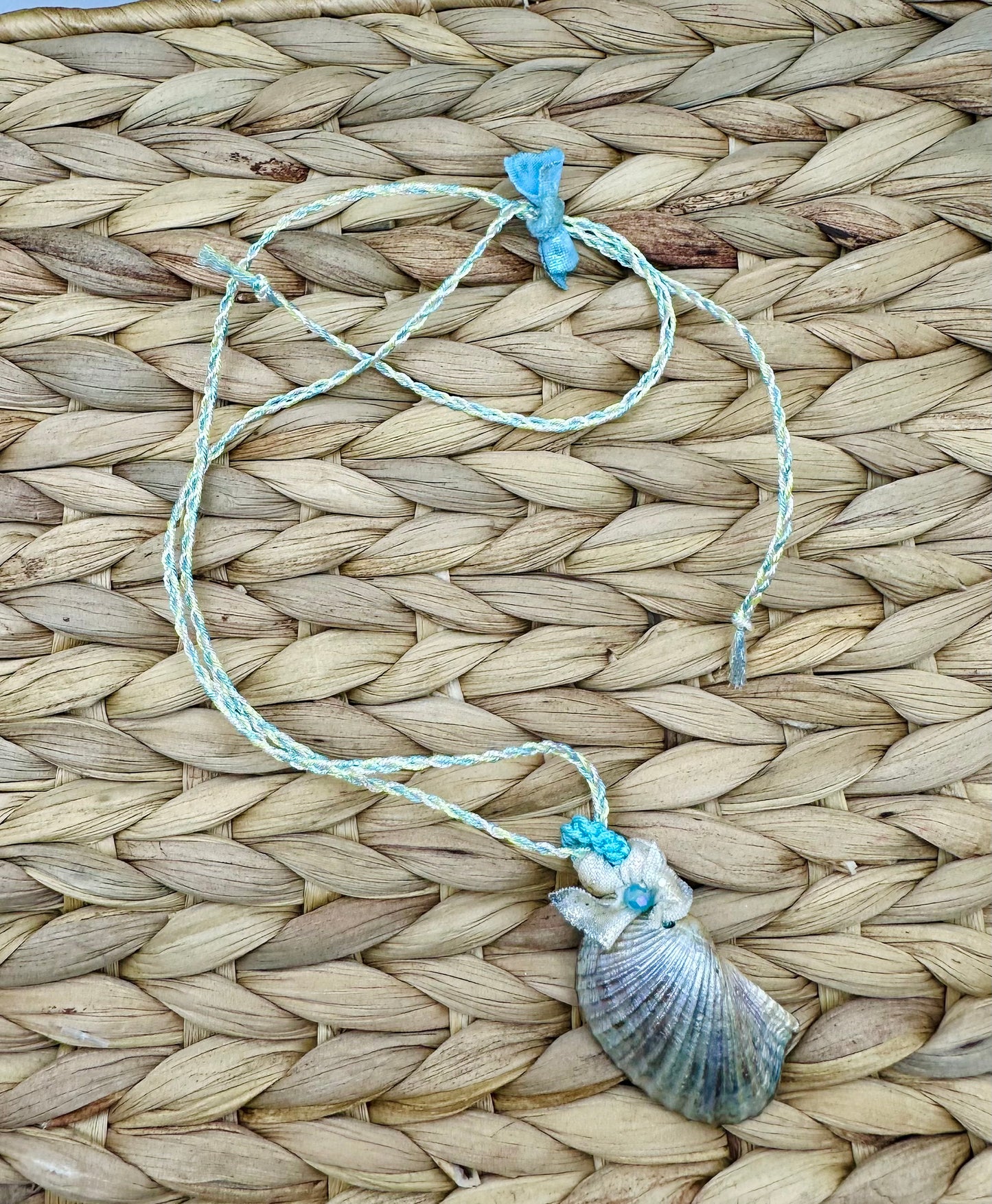 Hand made necklace- satin threaded cord and sea shell