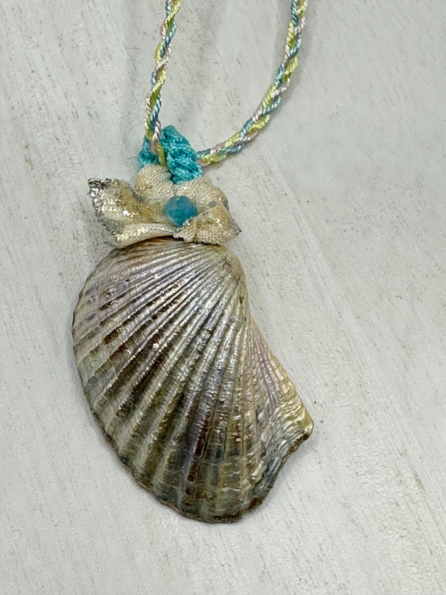 Hand made necklace- satin threaded cord and sea shell